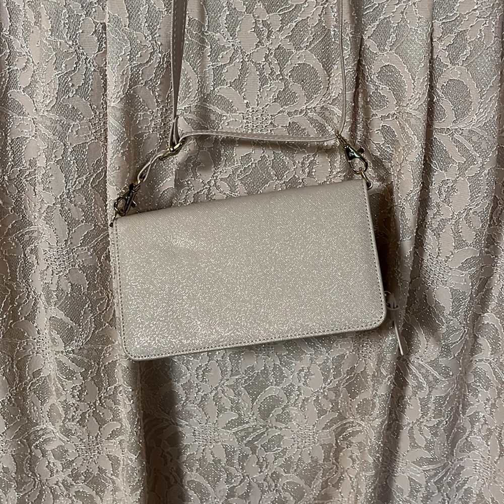 Light pink metallic thread clutch